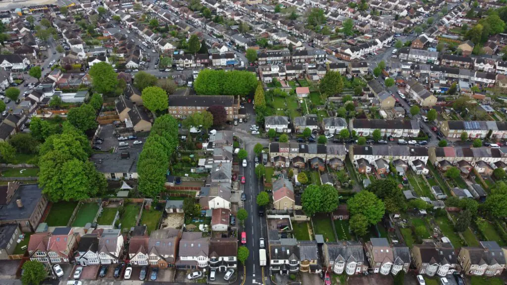 High-angle aerial view of a residential neighborhood in Luton, England showing houses and streets.